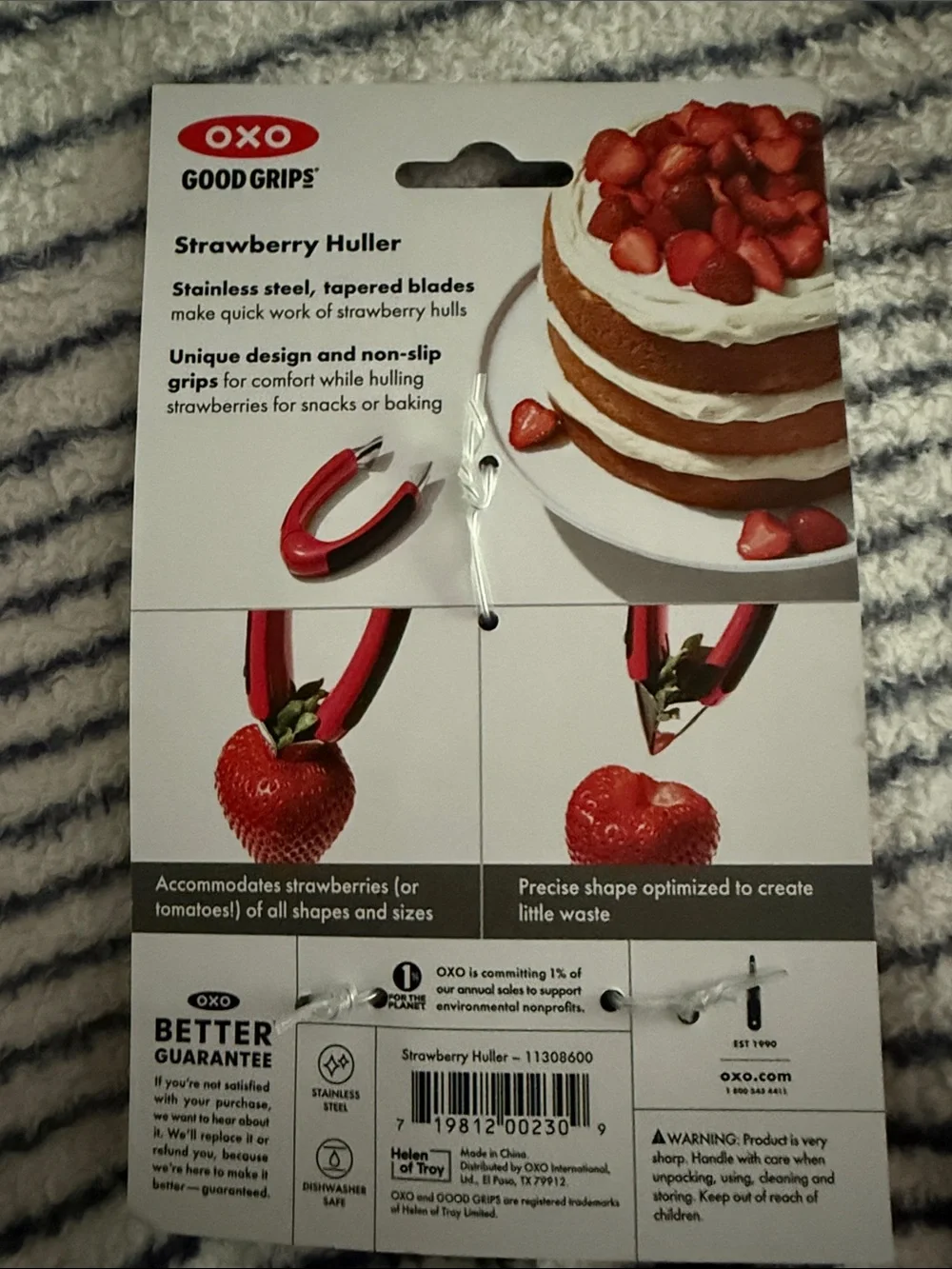 OXO Good Grips Strawberry Huller in bright pink-red